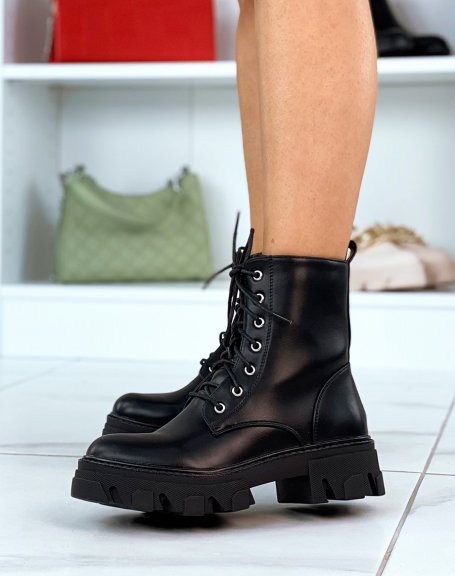 Black lace-up ankle boots with notched sole