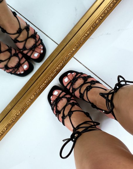 Black lace-up sandals with silver heel