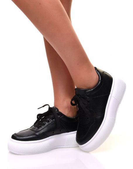 Black lace-up sneakers with white high platforms