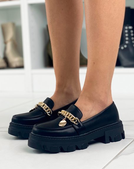 Black loafers with chain and gold jewel and notched sole