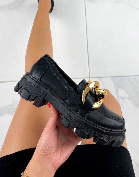 Black loafers with double golden buckle and notched sole