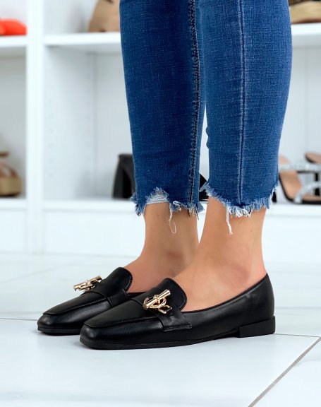 Black loafers with golden buckle