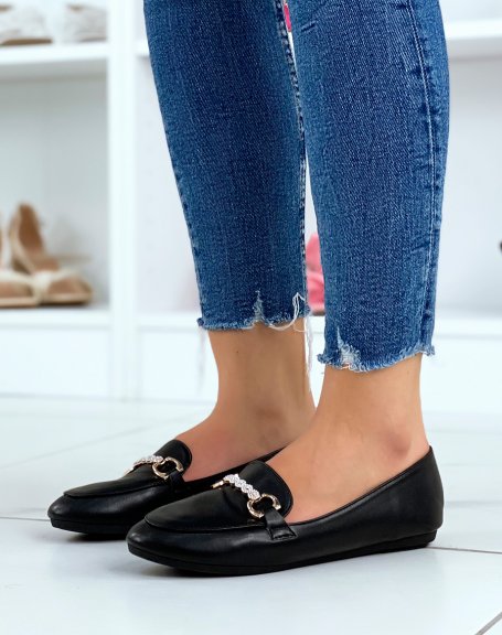 Black loafers with golden buckles and rhinestones