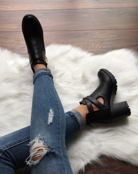 Black lugged ankle boots with crossed buckles