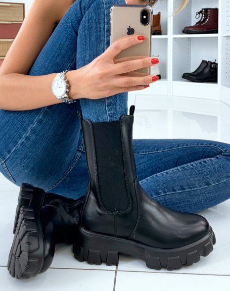 Black mid-calf boots with chunky lug sole