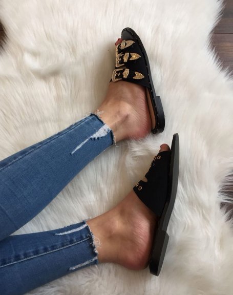Black mules with golden buckles