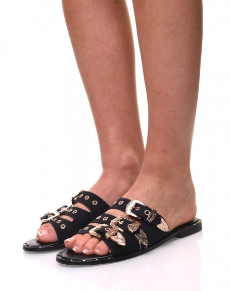 Black mules with golden buckles