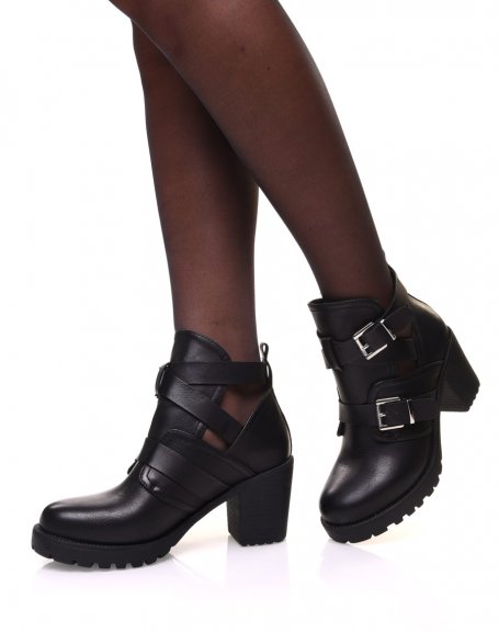 Black openwork ankle boots with multiple straps and heels