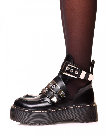 Black platform boots with multiple straps