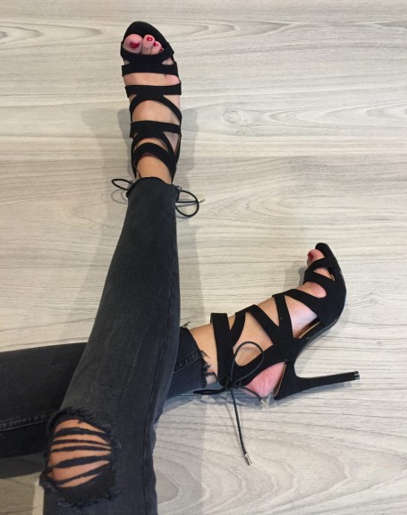 Black pumps with multiple straps and lace at the back
