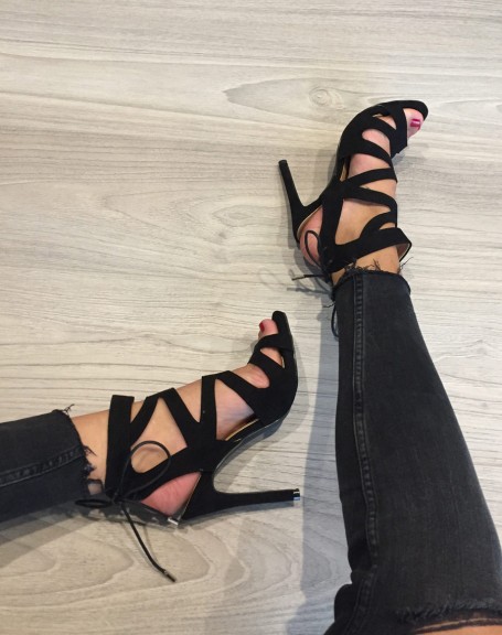 Black pumps with multiple straps and lace at the back