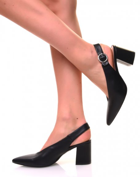 Black pumps with small heels open at the back