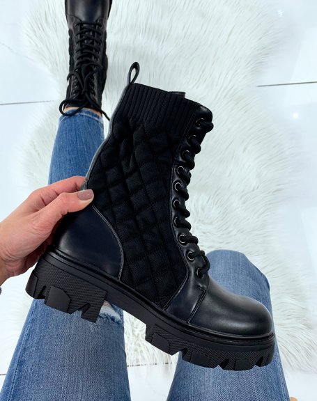 Black quilted high ankle boots with notched sole