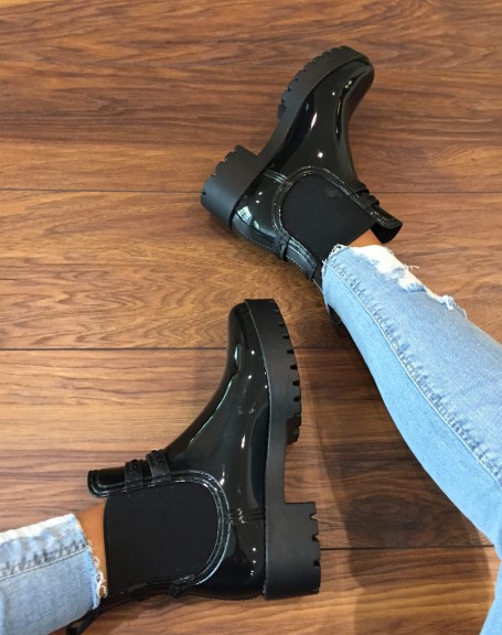 Black rain boots with lug sole