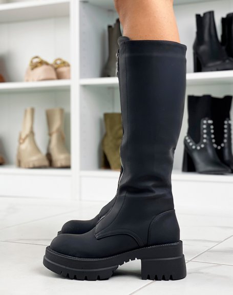 Black rubber boots with long silver zip heel