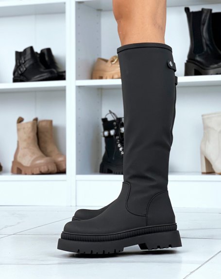 Black rubber boots with lug sole