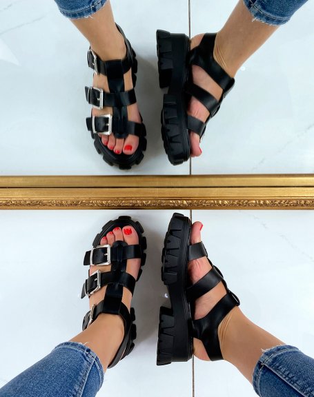 Black sandal with notched sole and multiple adjustable straps