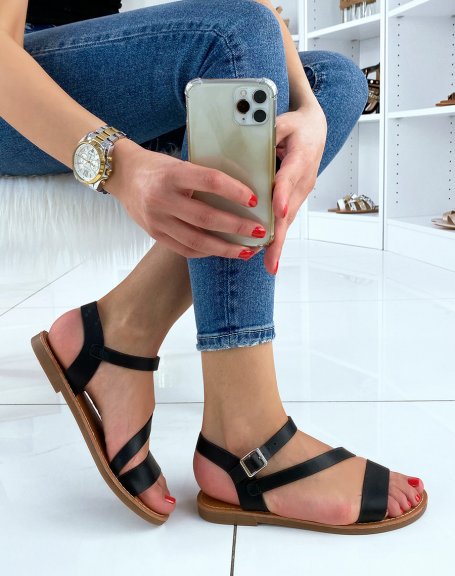 Black sandals with asymmetrical straps