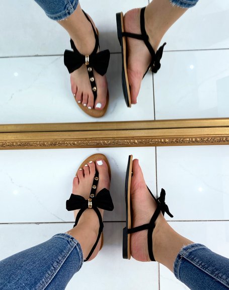 Black sandals with bow and gold details