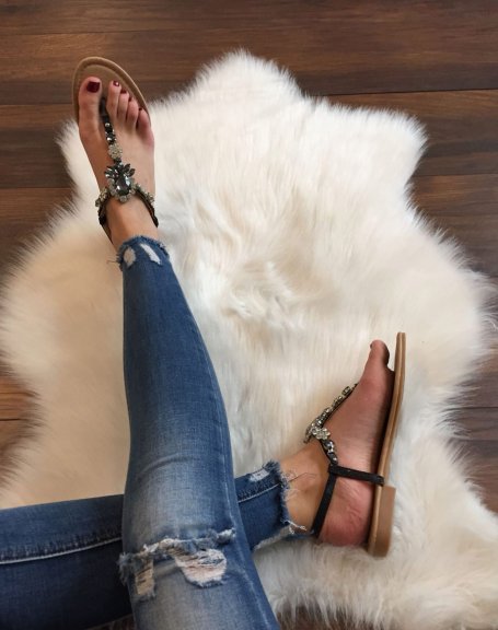 Black sandals with central jewels