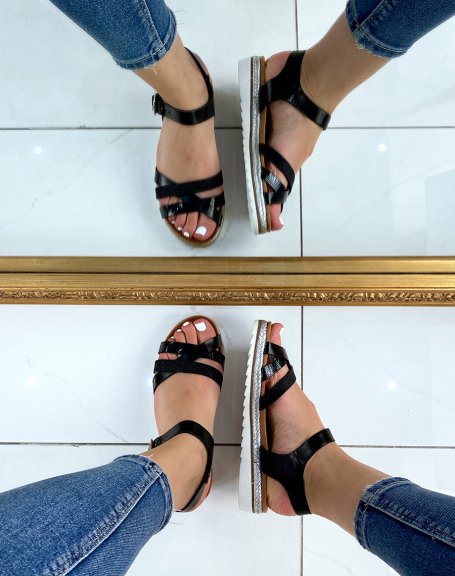 Black sandals with crossed straps