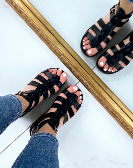 Black sandals with multiple straps and gold details