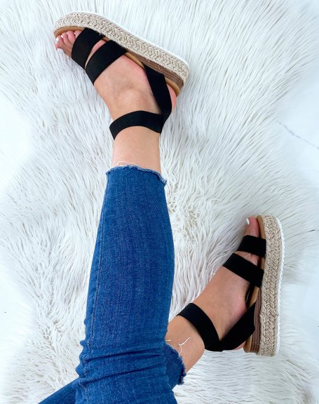 Black sandals with multiple straps and jute sole