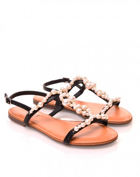 Black sandals with pearl and rhinestone details