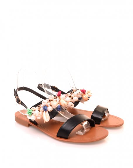 Black sandals with pearls and shells
