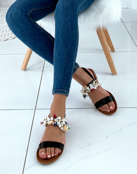 Black sandals with pearls and shells