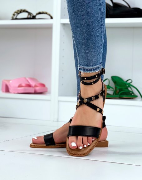 Black sandals with round gold studs