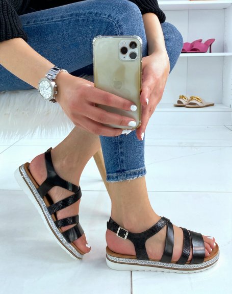 Black sandals with silver sole