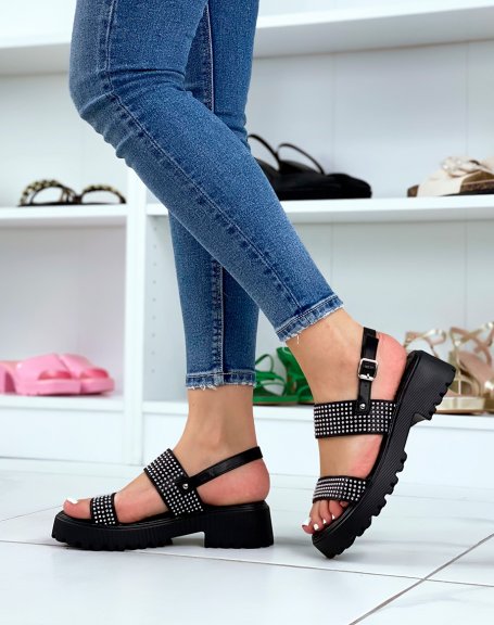 Black sandals with small notched heel and silver studs