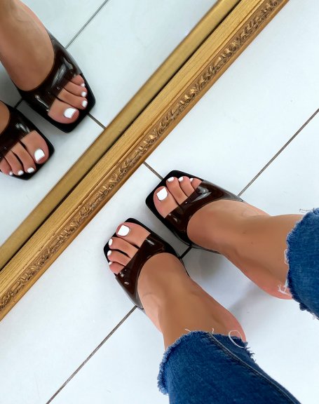 Black sandals with square heel and chunky transparent strap