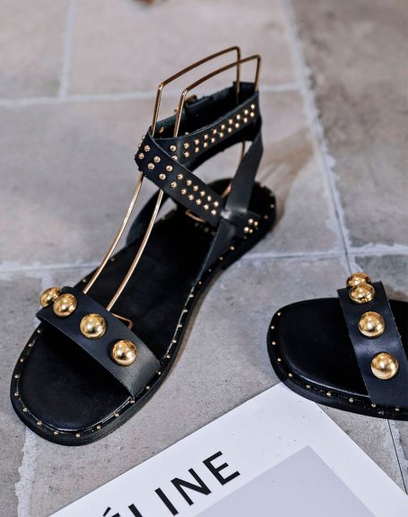 Black sandals with thick and thin gold studs