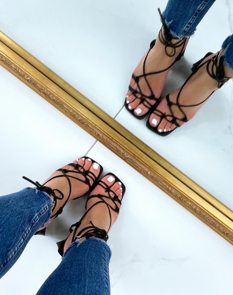 Black sandals with thick heel and multiple straps