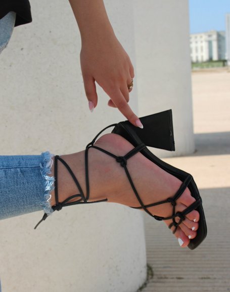 Black sandals with thick heel and multiple straps