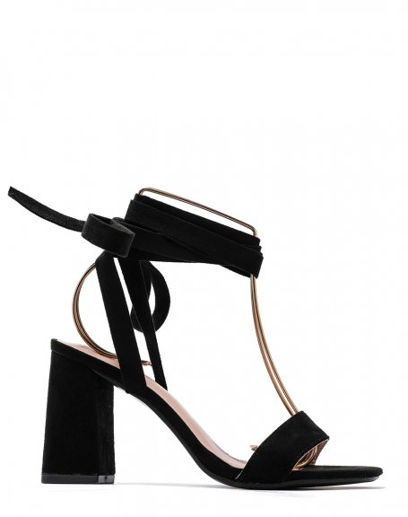 Black sandals with thick strap and long heeled laces