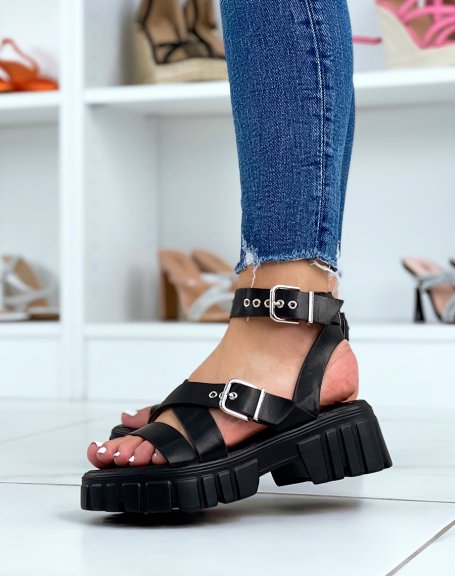 Black sandals with thick straps and notched sole