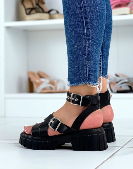 Black sandals with thick straps and notched sole