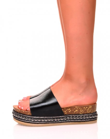 Black shiny wedge mules with details