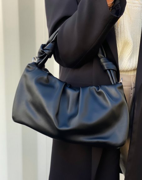 Black shoulder bag with rolled up strap