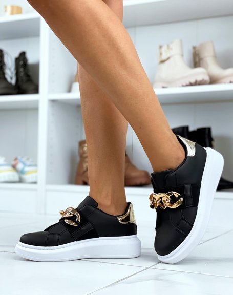 Black sneakers with gold chain