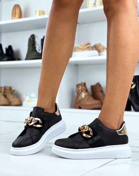 Black sneakers with gold chain