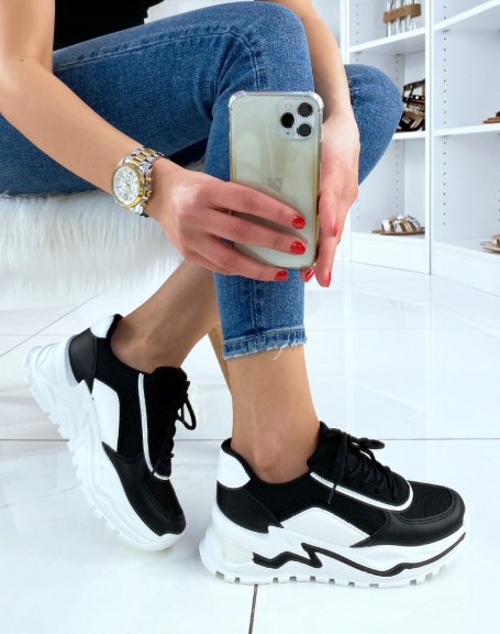 Black sneakers with large white platform