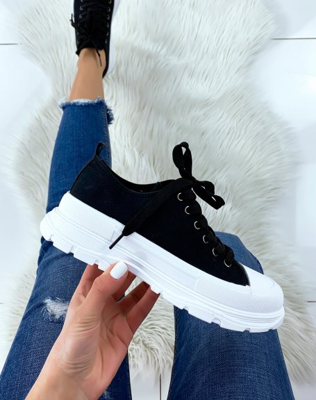 Black sneakers with notched sole