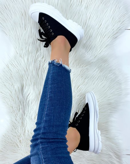 Black sneakers with notched sole