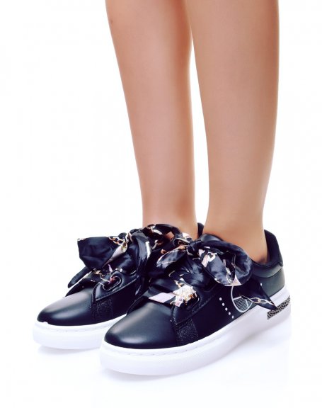 Black sneakers with ribbons