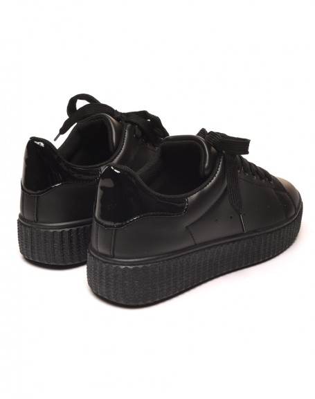 Black sneakers with thick sole and black detail