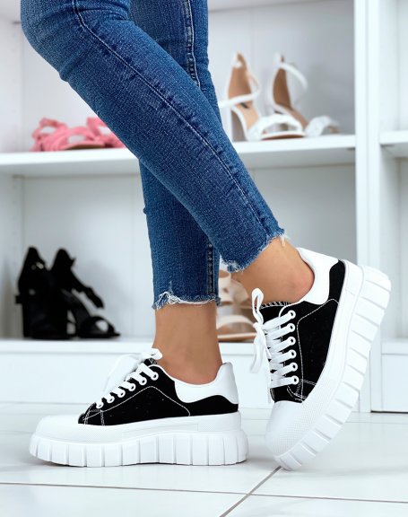 Black sneakers with white thick sole